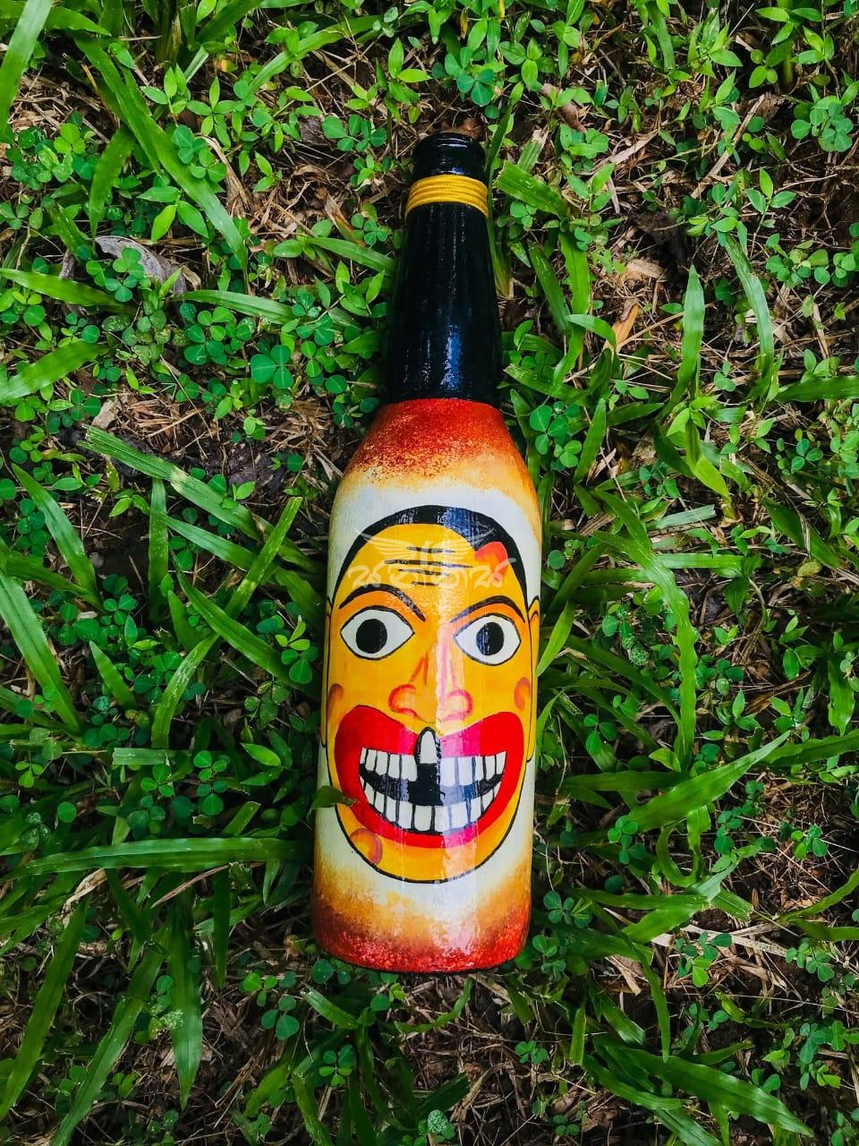 The Traditional Kolam Mask Faces on Bottle
