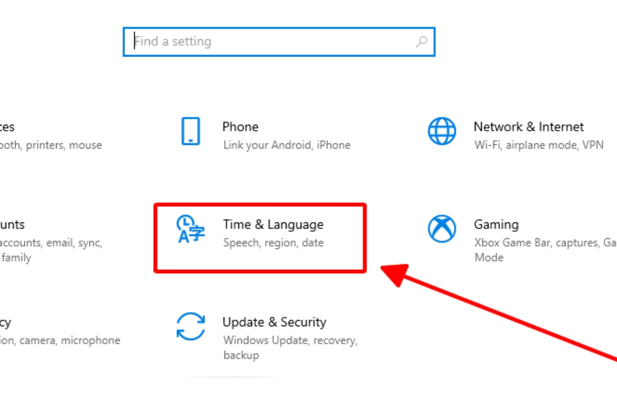 Trong menu cài đặt, Chọn Time & Language