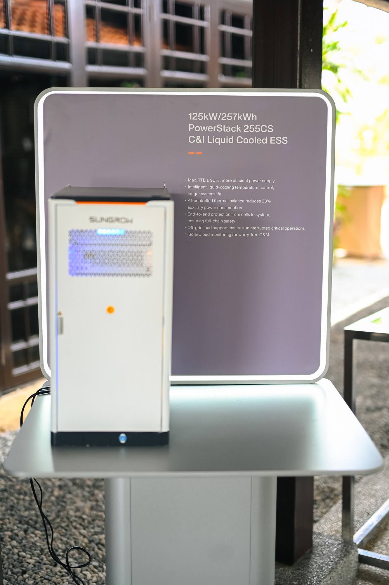Scale model of the Sungrow PowerStack 255CS liquid-cooled C&I energy storage cabinet on a display stand