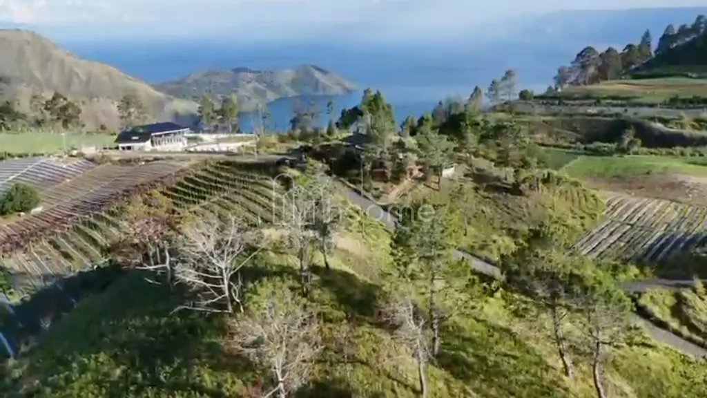 JUAL TANAH VIEW DANAU TOBA DAN BUKIT SIPISOPISO DIPINGGIR JALAN ASPAL (081264304189)