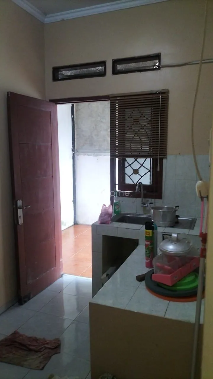 Disewa Rumah STRATEGIS DI PURI RAWADENOK BLOK B5 — foto 1 dari 4