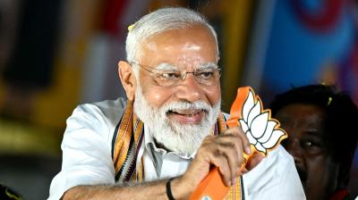 Prime Minister Narendra Modi during a roadshow ahead of the Lok Sabha elections, in Chennai, Tuesday, April 9, 2024. (AFP)