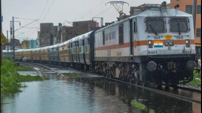  A train is stationed on a waterlogged track after heavy rain, in Muzaffarpur. PTI photo