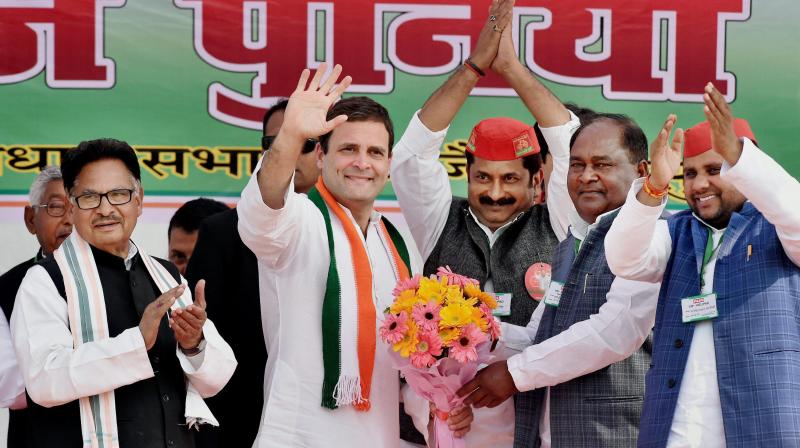 Congress Vice President Rahul Gandhi waves at an election rally in Barabanki district. (Photo: PTI)
