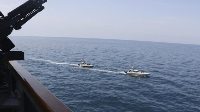 A group of 11 Iranian naval vessels made \dangerous and harassing\ maneuvers near U.S. ships in the Persian Gulf near Kuwait on Wednesday (AP)