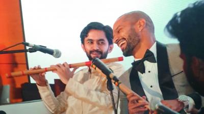 Shikhar Dhawan learns to play the flute