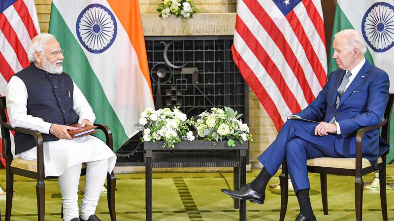 Prime Minister Narendra Modi and U.S. President Joe Biden hold talks on the sidelines of Quad Summit meeting, in Tokyo, Tuesday, May 24, 2022. (PTI) 