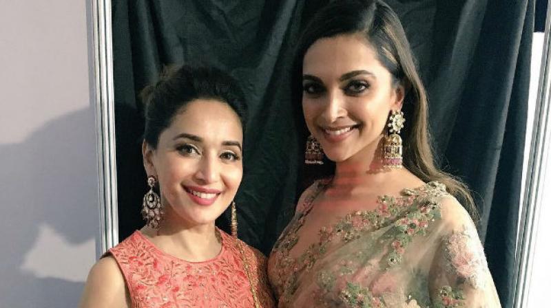 Deepika Padukone and Madhuri Dixit. Deepika Padukone and Madhuri Dixit.