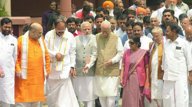 Vice-presidential candidate Venkaiah Naidu (third from left) with Prime Minister Narendra Modi, BJP president Amit Shah, senior BJP leader L.K. Advani and other NDA leaders on his way to file nomination papers at Parliament in New Delhi on Tuesday. (Photo: Pritam Bandyopadhay)
