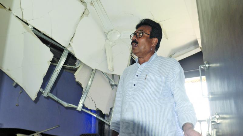NCP MLA Satish Patil showing the collapsed roof of his flat in Manora at Nariman Point. (Photo: Rajesh Jadhav)