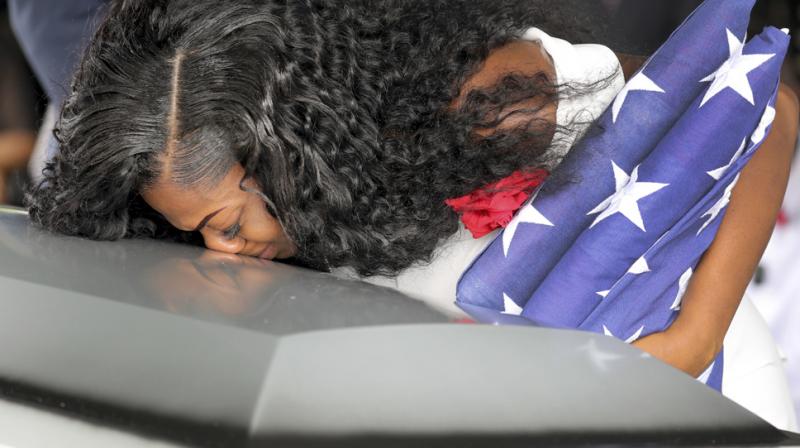 \The only way he remembered my husbands name because he told me he had my husbands report in front of him and thats when he actually said La David,\ Myeshia Johnson said. (Photo: AP)