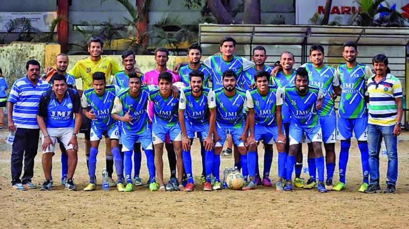 The JMJ Sports Club players in a happy mood after defeating Mother Theresa Foundation in the second division final of the MDFA League The JMJ Sports Club players in a happy mood after defeating Mother Theresa Foundation in the second division final of the MDFA League