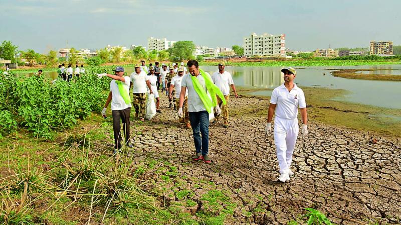IAS officer and District Collector of Mancherial, R.V. Karnan not only rescued a 48-acre heritage lake from being encroached but also started an awareness campaign to show how the tank can help store rainwater while saving colonies from floods.