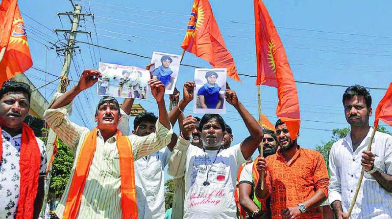 Bajrang Dal activists protest against Amulya Leona, who raised pro-Pakistan slogans, in Bengaluru.