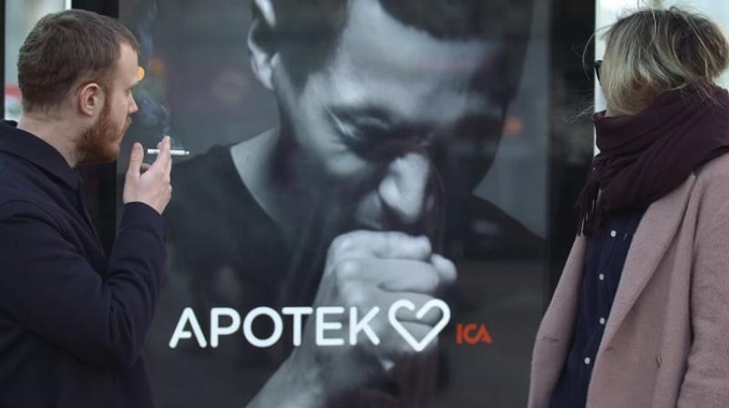 The effect of the coughing billboard was created by fixing smoke detectors to the screen. (Credit: YouTube)