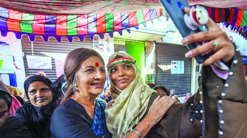 CPI(M) leader Brinda Karat poses for a selfie with  protestors demonstrating against the CAA at Old Washermanpet in Chennai on Thursday. (Photo: PTI)