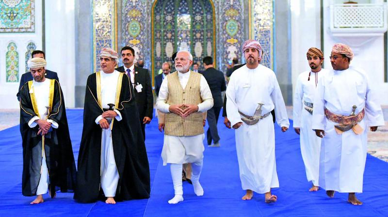 Prime Minister Narendra Modi visits the Sultan Qaboos Grand Mosque in Muscat, Oman. (Photo: PTI)