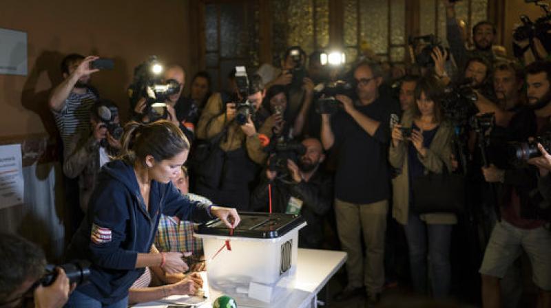 The most recent poll commissioned by the regional government in July showed 41.1 percent in favour of seceding, and 49.4 percent against. (Photo: AP)