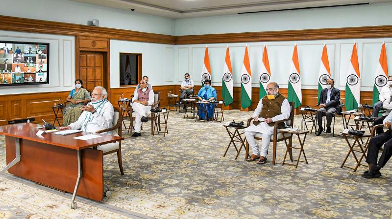 Prime minister Narendra Modi interacts with chief ministers via video conferencing to discuss the plan for tackling the COVID-19 pandemic on Monday, April 27, 2020. (PIB)