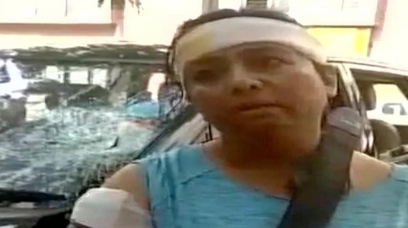 The victim, identified as Nandini, alleged foul play on the end of the police, stating that she felt trapped in the situation as no action was taken against the alleged illegal cow mafia, as promised to her upon reporting the activity. (Photo: ANI/Twitter)