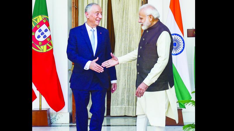Prime Minister Narendra Modi shakes hands with Portuguese President Marcelo Rebelo de Sousa at Hyderabad House on Friday. (Photo: PTI)