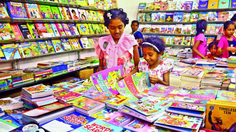 Children browsing at Chennai Book Fair on Saturday.