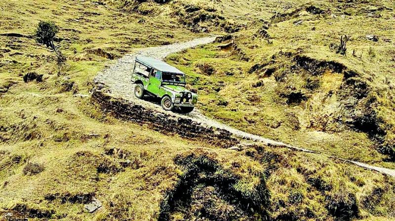 The Land Rover chugs along.