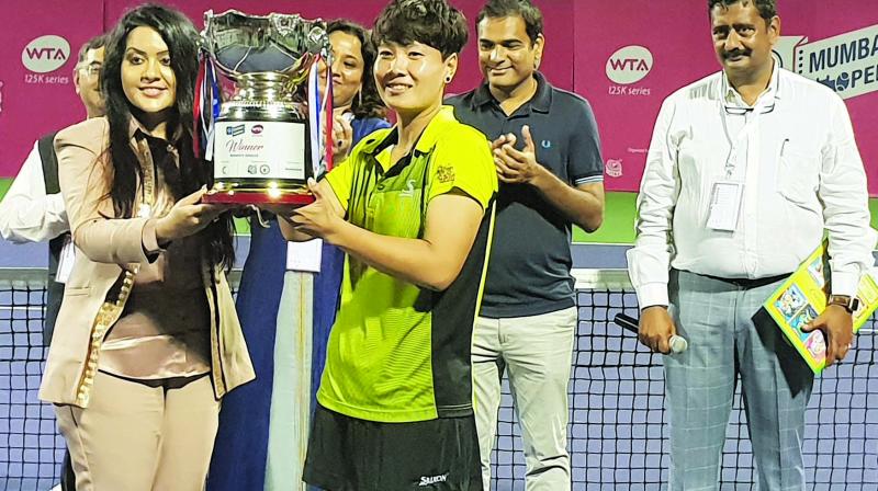 Natela Dzalamidze and her partner Veronika Kudermetova, seeded third, won the doubles title with a 6-4, 7-6 (4) victory over the fourth-seeded pair of Bibiane Schoofs and Barbora Stefkova.