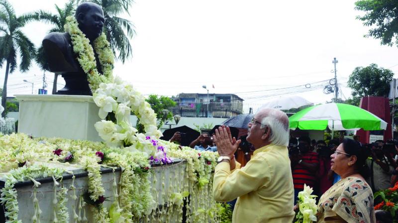 State minister Sovandeb Chatterjee along with KMC chairperson Mala Roy paying tribute to the renovated bust of Shyama Prasad Mukherjee at Keoratola  crematorium on Saturday, which was vandalised by the miscreants. (Photo: Abhijit Mukherjee)