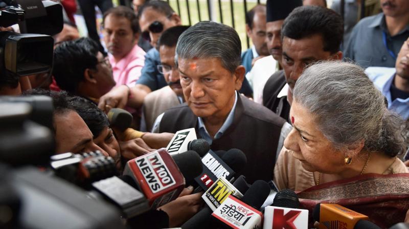 Congress Senior Leader Ambika Soni and Uttrakhand CM Harish Rawat. (Photo: PTI/File)