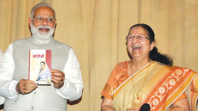 Prime Minister Narendra Modi releases the book Matoshree, authored by Lok Sabha Speaker Sumitra Mahajan (right), at Parliament library building in New Delhi. (Photo: Pritam Bandyopadhyay) Prime Minister Narendra Modi releases the book Matoshree, authored by Lok Sabha Speaker Sumitra Mahajan (right), at Parliament library building in New Delhi. (Photo: Pritam Bandyopadhyay)