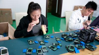 Electronics being assembled in a facility in Shanghai. (Photo | Flickr- Mitch Altman)