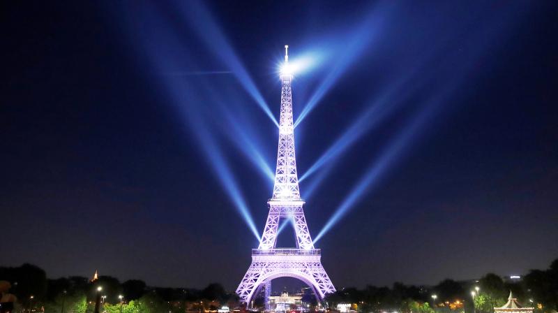 Paris commemorates 130th anniversary of the Eiffel Tower