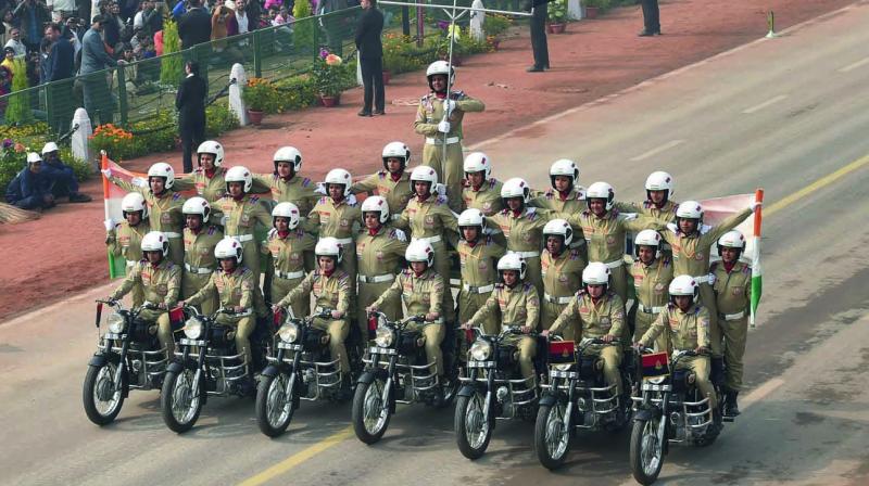 BSFs all-women team  Seema Bhawani  (above) performs on motorcycles during the 69th Republic Day parade at Rajpath in New Delhi on Friday.