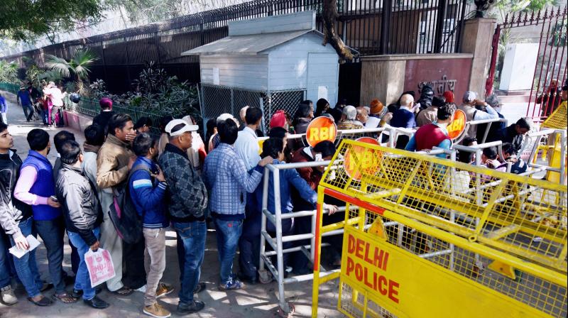 People standing in long queues to exchange cash from Reserve Bank of India in New Delhi. (Photo: PTI) People standing in long queues to exchange cash from Reserve Bank of India in New Delhi. (Photo: PTI)