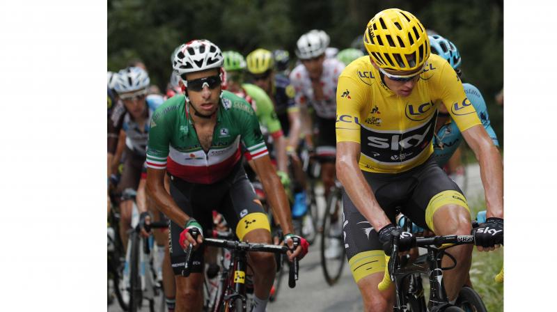 Chris Froome, wearing the overall leaders yellow jersey, and Italys Fabio Aru climb during the seventeenth stage of the Tour de France cycling race over 183 kilometers (113.7 miles) with start in La Mure and finish in Serre-Chevalier, France (Photo: AP)