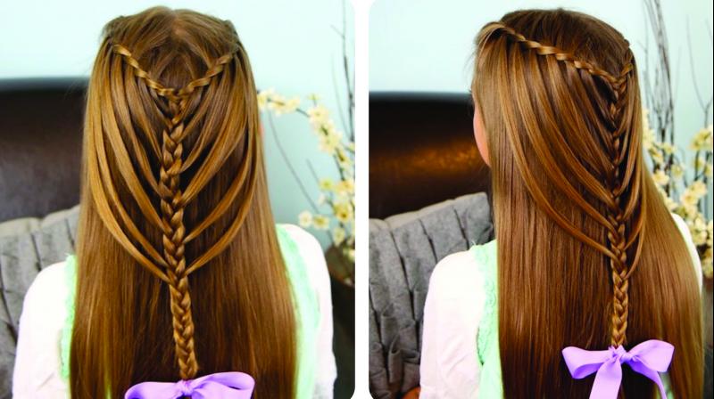 Run your finger through the front of your hair to loosen it. Run your finger through the front of your hair to loosen it.