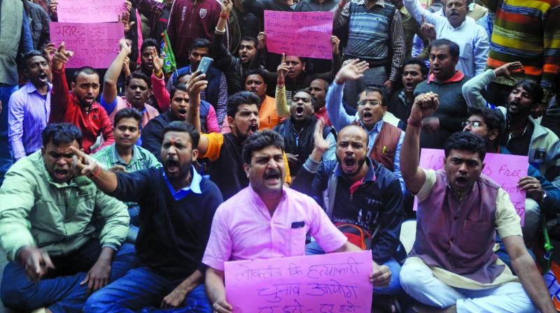 State BJP supporters agitate in front of state election office at BBD Bag on Thursday demanding peaceful and fair election at Sabong. (Photo: Asian Age)