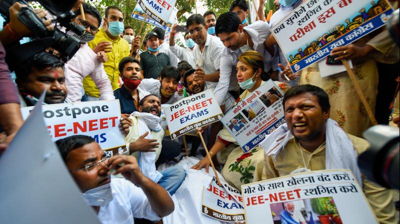 Activists of National Students Union of India (NSUI ) take part in a demonstration in front of the NSUI headquarters in New Delho. PTI Photo