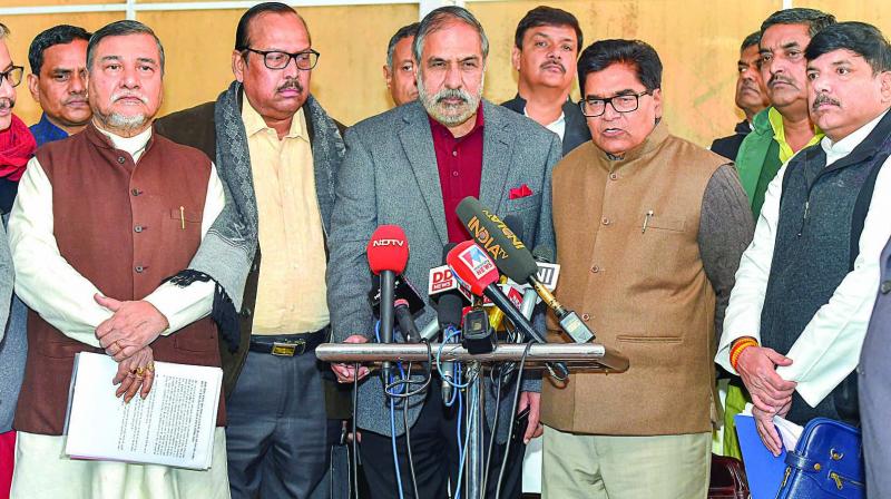 Senior Congress leader Anand Sharma (centre), flanked by senior SP leader Ram Gopal Yadav (right) and Trinamul MP Sukhendu Sekhar Roy with other Opposition leaders addresses the media at Parliament House in New Delhi. (Photo: PTI)