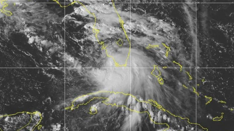 Image provided by NOAA shows the formation of Tropical Storm Sally. Tropical Storm Sally has formed off south Florida, becoming the earliest 18th-named tropical storm on record in a busy Atlantic hurricane season. (NOAA via AP)