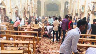 Image result for 215 die, over 500 injured in explosions at churches and hotels in Sri Lanka