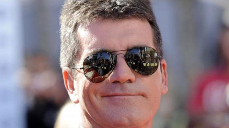 Simon has created popular television reality shows. (Photo: AP)