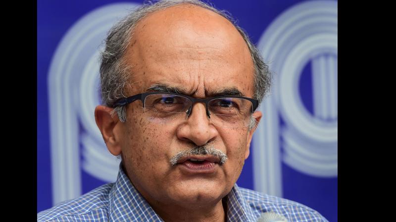Activist-lawyer Prashant Bhushan addresses a press conference, after Supreme Court imposed a token fine of one rupee as punishment in a contempt case against him, in New Delhi. PTI Photo
