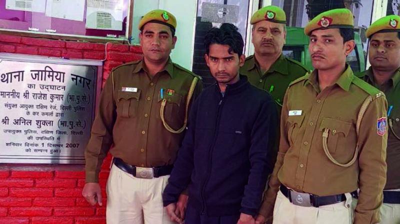 Accused Mohammed Sharfaraz, who belongs o Bulandshahr, after his arrest. (Photo: PTI)