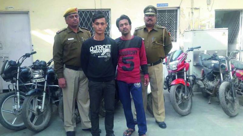 The two accused after their arrest.