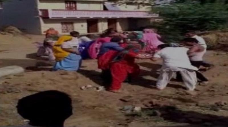 After the video went viral, the police have now registered a case against the sarpanchs family including four other people. (Photo: ANI Twitter)