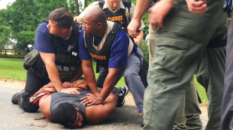 Officers arrest suspect Cory Godbolt on Sunday, May 28, 2017, following several fatal shootings Saturday in Lincoln County, Mississippi, officials said. (Photo: AP)