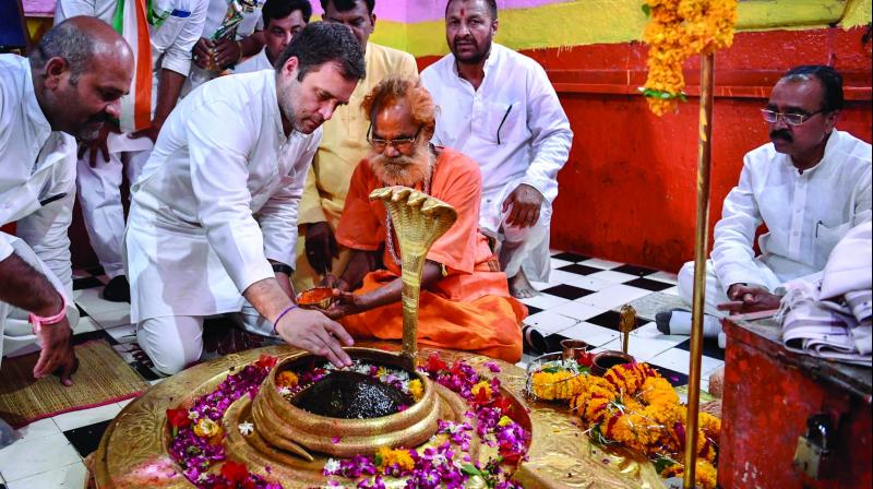 Congress president Rahul Gandhi offers prayers at Tilbhandeshwar Mahadev temple ahead of an election rally in Tarana, Madhya Pradesh, on Tuesday. (Photo: PTI) Congress president Rahul Gandhi offers prayers at Tilbhandeshwar Mahadev temple ahead of an election rally in Tarana, Madhya Pradesh, on Tuesday. (Photo: PTI)