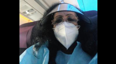 The writer, during one of her flights. (Image by arrangement)